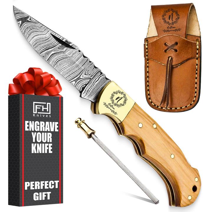 Engraved Damascus steel pocket knife with olive wood handle and leather sheath – nature-inspired gift for collectors or anniversaries